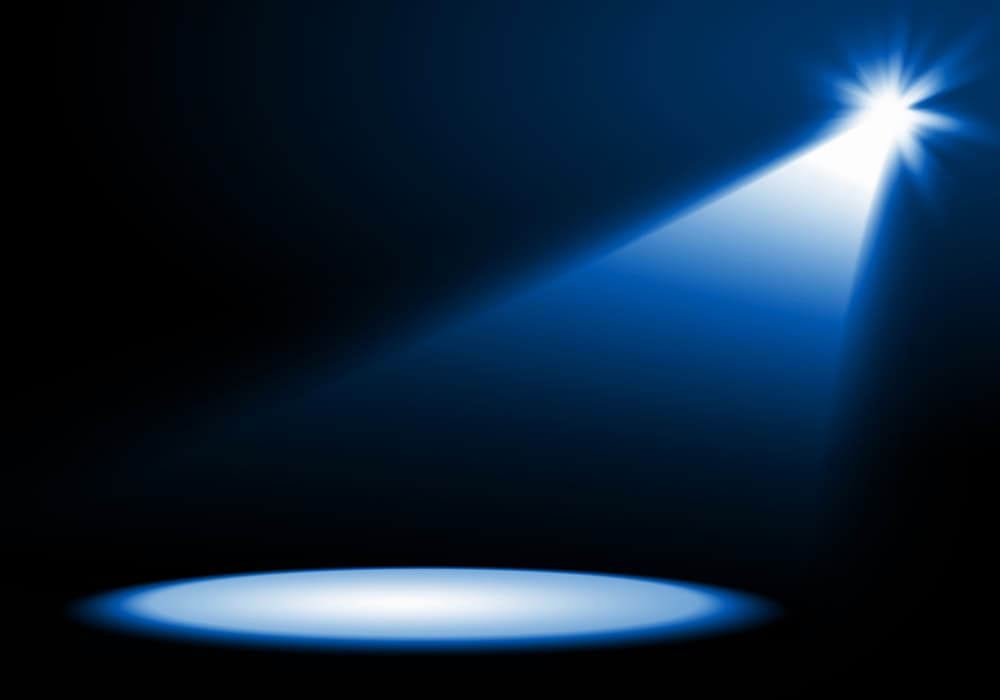 Spotlight als beeld voor eigenheid en zichtbaarheid.